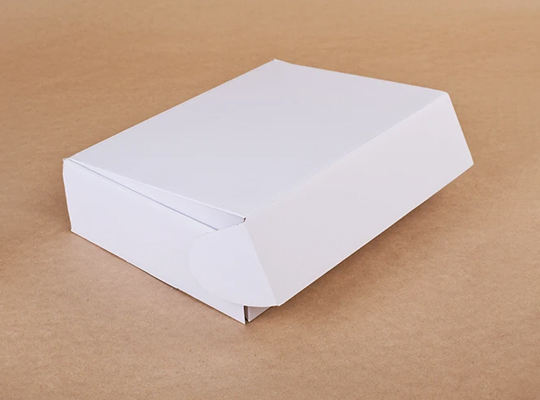 white cardboard boxes
